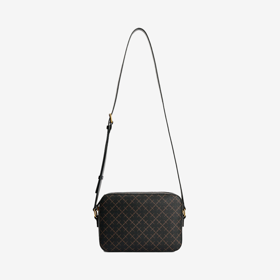 Crossbody-väska i färgen Dark Chocolate med Signature Flower-motiv och guldiga detaljer.