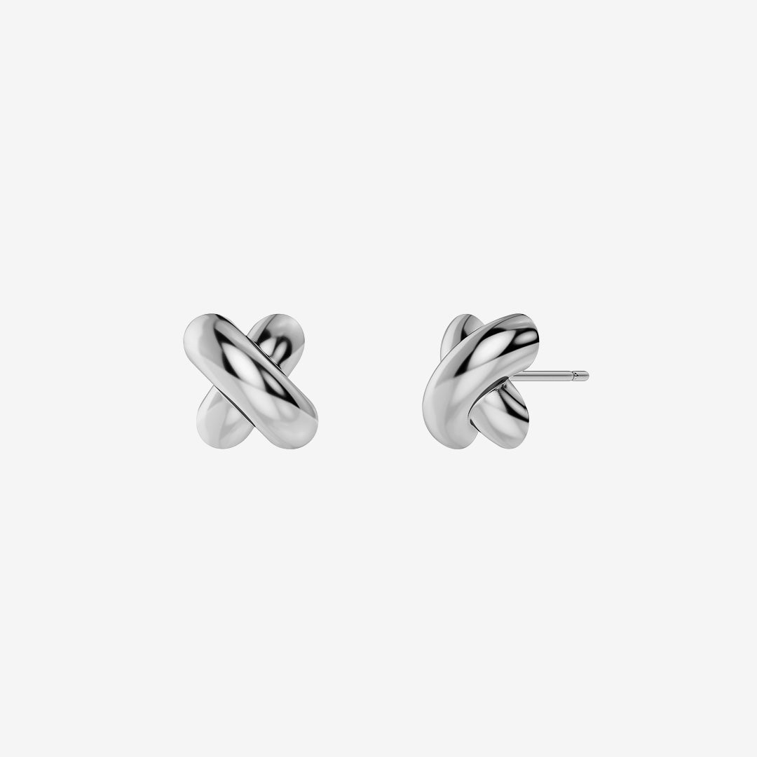 Alexa Studs S små örhängen i blankt rostfritt stål med skulptural design