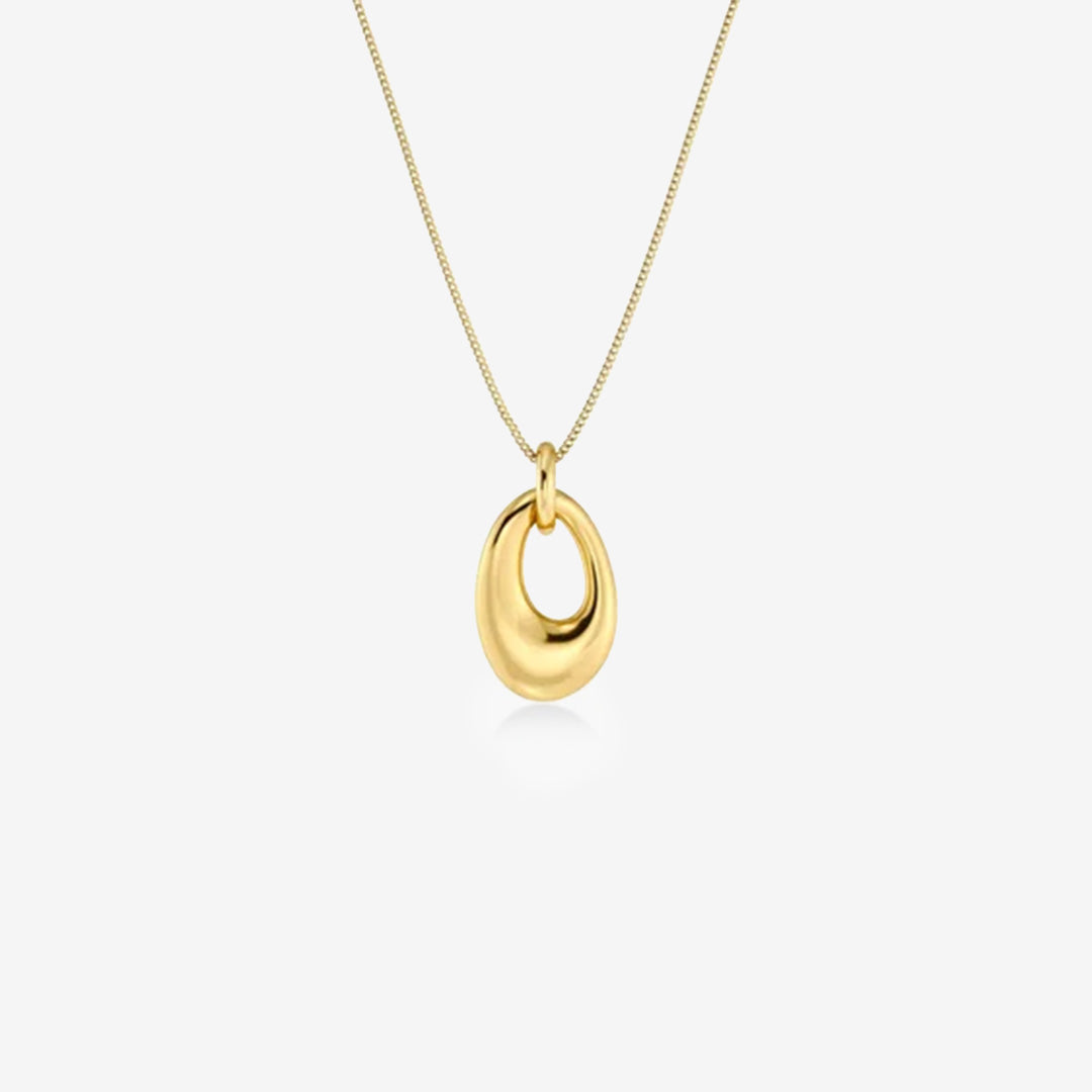 Guldpläterat halsband med asymmetriskt skulpturalt hänge och fasettslipad ankarkedja