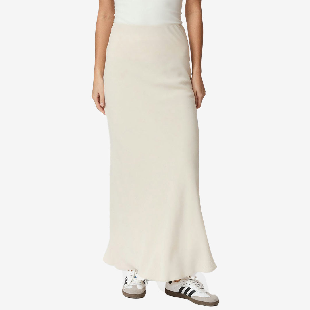 Viso Linen Skirt i naturlig färg, lång kjol i viscose- och linneblandning med elastisk midja och snedskuren siluett.