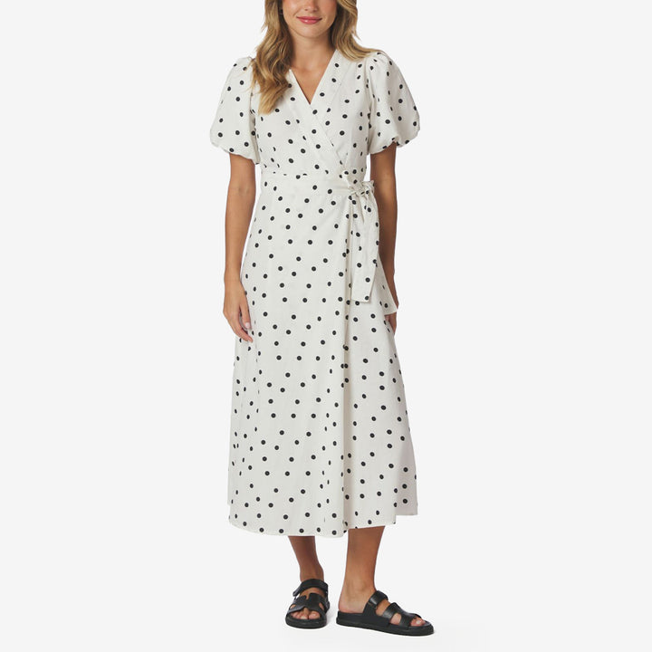 Neo Noir Clarine Linen Dot Dress i vitt med prickigt mönster, omlottdesign och korta puffärmar för dam