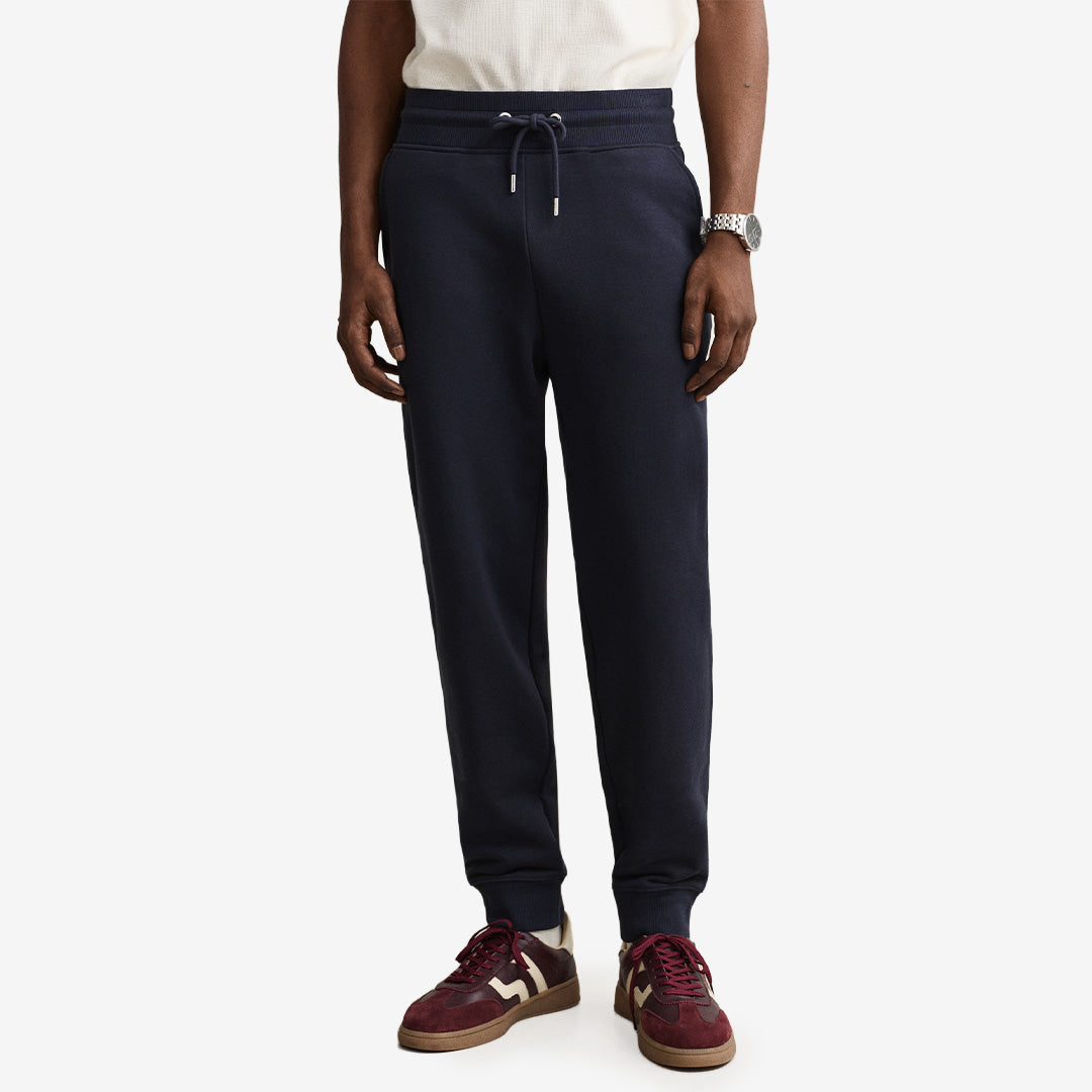 Gant Shield Sweatpants 2009026 i Evening Blue med elastisk midja och ribbade muddar för herr