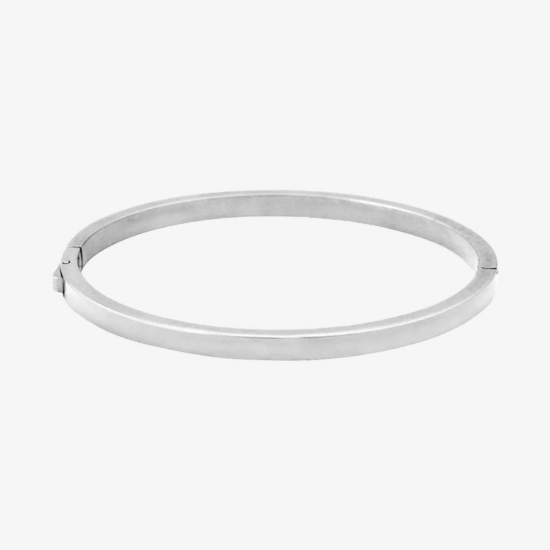 Fave Bangle i blankt rostfritt stål, smalt armband med låsknapp, innermått 16,5–18 cm