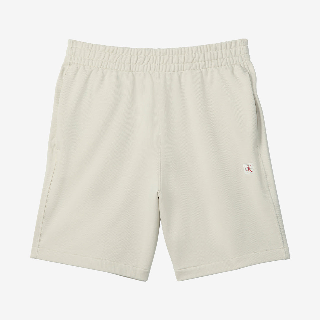 Oatmealfärgade shorts EU 350 Terry Badge SH i 100% bomull med badge-detalj