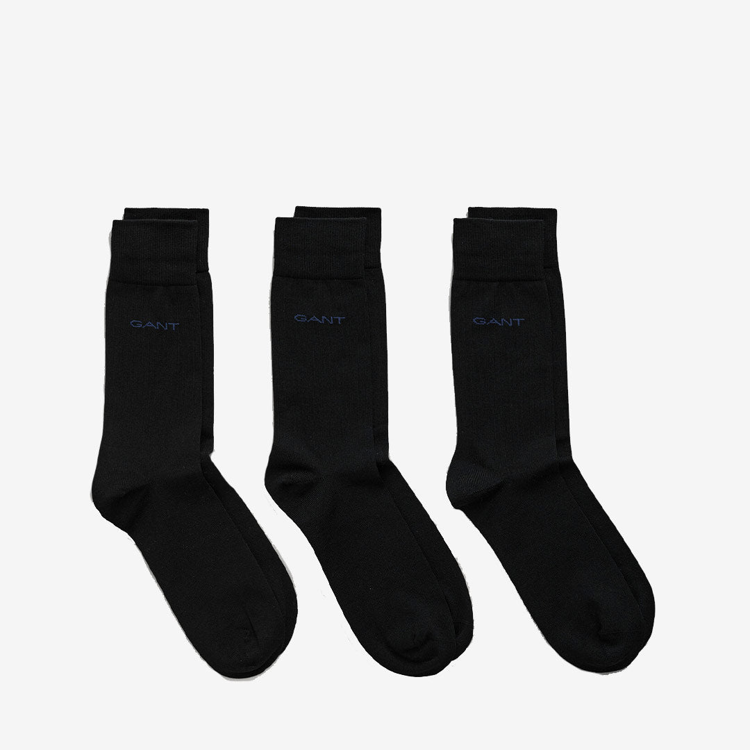 3-pack svarta strumpor från Gant i merceriserad bomull med mid-vadhöjd och diskret logotyp vid ankeln.